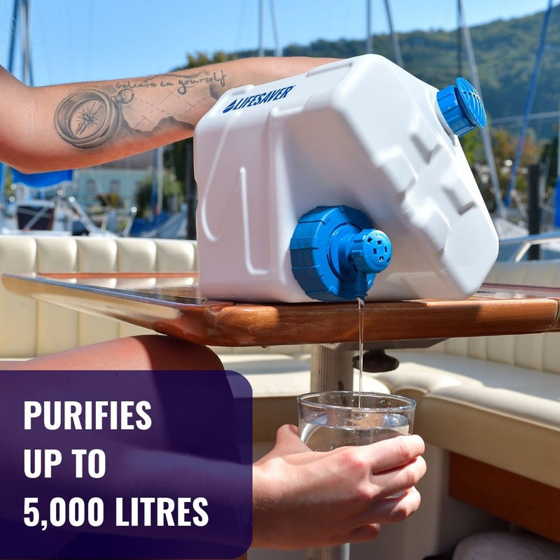 Load image into Gallery viewer, A LifeSaver cube filling a glass of water on a boat