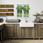 Rustic kitchen with wooden cabinets, a white sink, a window with greenery outside, and a LifeSaver C1 water purifier on the counter. Sheves filled with preserved homegrown food and herbs drying in front of the window